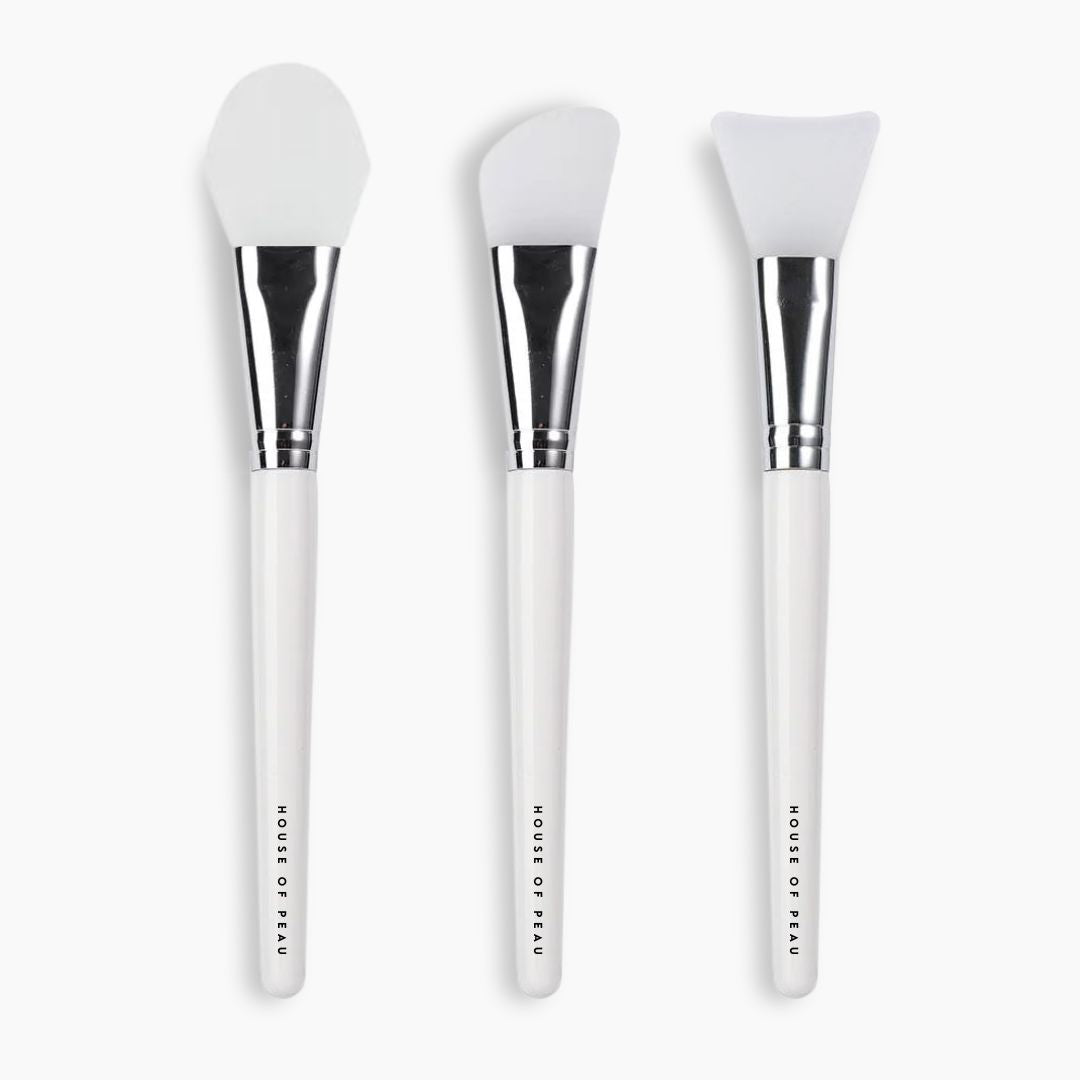 lot_pinceaux_silicones_blanc_visage_masque_gommage_crème_cosmétique_beauté_skincare_application_trois